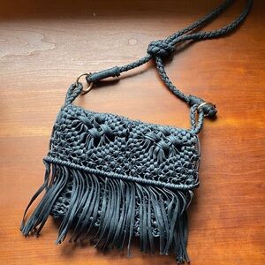 Elegant Black Woven Crossbody Bag with Fringe